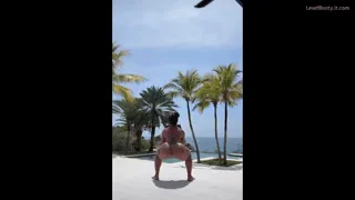 Perfect place squats ... Beach , Sun , Thong and an empowered MILF